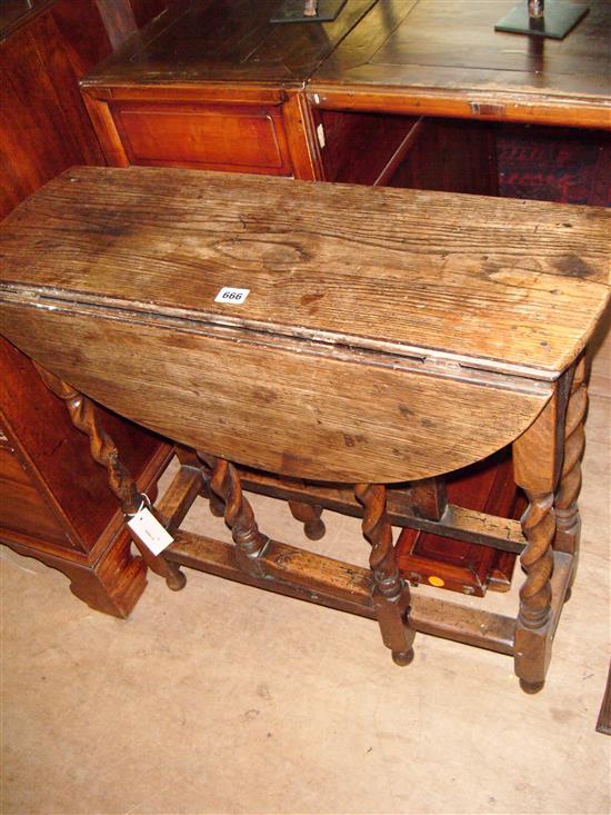 Oak circular gateleg table with barleytwist underframe